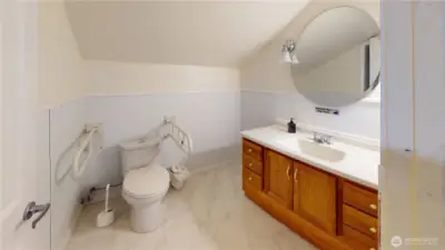 View of the shower in the third bathroom.