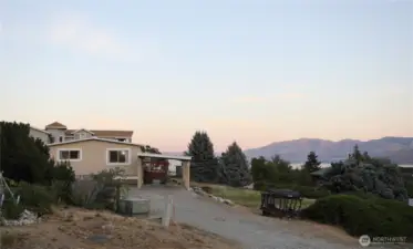 Experience unforgettable sunsets over Lake Chelan, where vibrant skies reflect off the water and create the perfect backdrop for evening relaxation or entertaining.