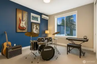 Virtually staged as a music room to demonstrate how this flexible bedroom can transform into the ultimate creative space. Ample room for instruments and practice sessions...ideal for musicians of any level.