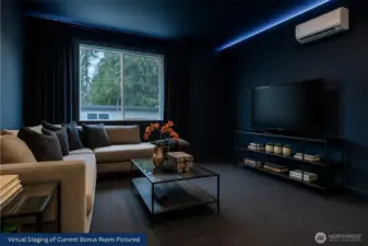 Virtual Staging: Imagine this room as a dramatic navy home theater with blackout drapes and LED lighting for movie nights and gaming.
