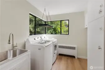 Upper Laundry with utility sink and pantry