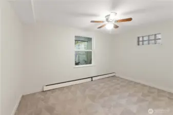 Lower bedroom with large window