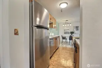 Kitchen features a trash compactor, built in microwave and new garbage disposal.