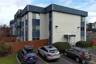 Unit is located on the south east corner of the building.  Stairway access from this parking area.