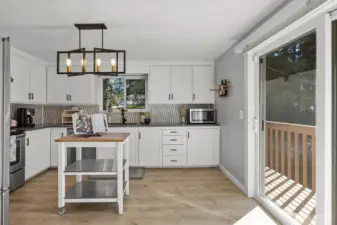 Kitchen, w/ access to deck
