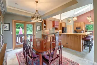 View of dining room into the open kitchen area.