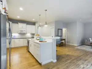 gourmet kitchen with quartz countertops