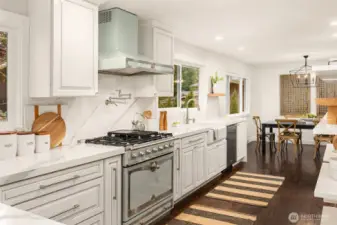 This kitchen is emphasized by an exquisite La Cornue gas cooking range and vent hood. Luxury!