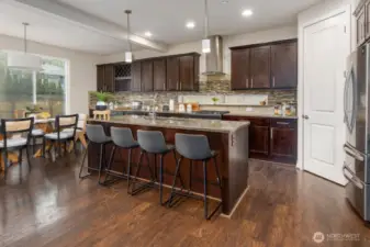 Expansive granite center island. Stainless Steel Appliances.