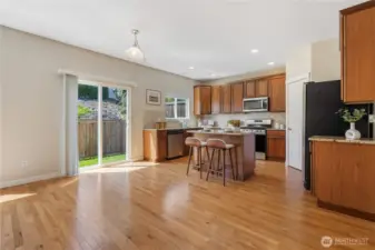 Extend your living space outdoors to the patio and fully-fenced back yard