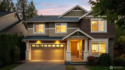 A serene glow wraps the home in twilight magic!