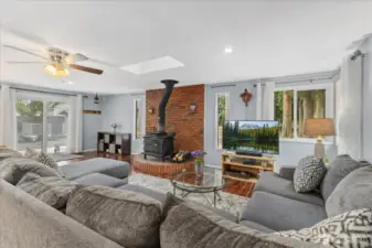 Gorgeous living area with beautiful slider opens to Trex deck to the back.