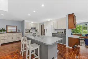Center island to kitchen.