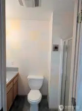 bathroom attached to primary bedroom