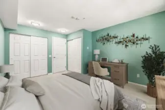 Comfortable primary suite with thoughtfully designed closets. (Virtually Staged)