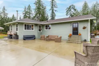 What a great outdoor entertainment patio. Door leads to the mud room.