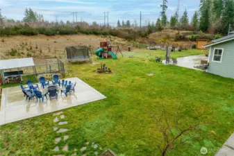 Patio for a fire pit area as well as a 2nd patio at the house. Dog kennel does not convey