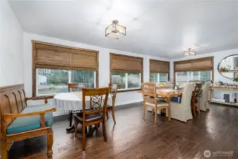 Dining area has room for everyone!! Check out those gorgeous 3/4 inch Oak floors!
