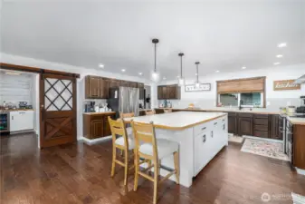 Now that is a center island! Check out this HUGE kitchen
