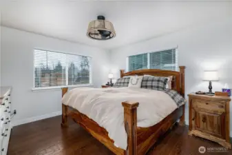 Primary bdr - Oak hardwood floors throughout main floor