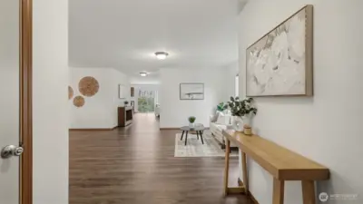 An inviting entry opens to a beautifully updated interior designed for both comfort and style.