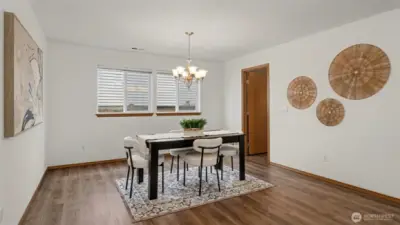 A generously sized dining area offering ample space for hosting, holiday gatherings, and everyday meals with ease.