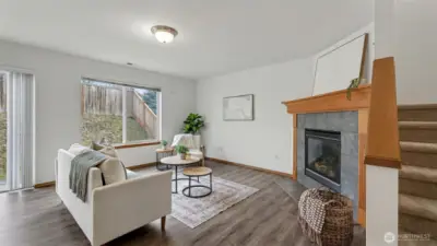 Designed for easy entertaining, this family room flows seamlessly between the kitchen and outdoor living areas.