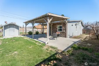 Back yard, covered patio and side yard.