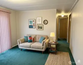 Livingroom1.  Digitally staged for illustration purposes.