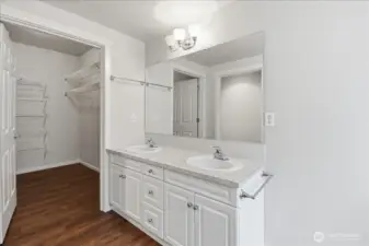 This is the primary vanity and walk-in closet not staged.