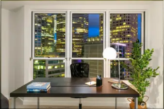 From the workspace, the skyline becomes an ever changing backdrop to daily routines within the penthouse.