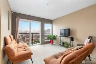 Living room with East-facing windows and downtown Everett views