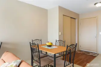 Dining area near entry with hardwood floors and ample space