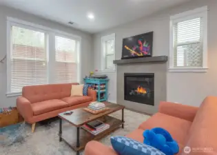 A cozy fireplace to keep you warm through chilly Northwest winters, paired with central air conditioning for comfortable living during beautiful summer months.