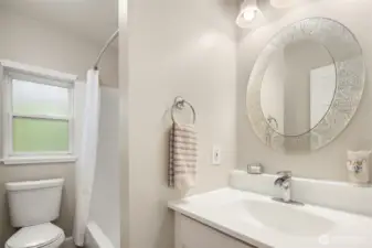 Upper guest bathroom thoughtfully designed to meet all of your guests' needs.