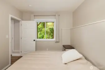 Guest bedroom located on the lower level, with potential for an accessory dwelling unit.