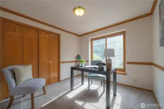 Convenient main floor office/den.  With a closet and across the hall from the 3/4 bath.