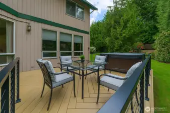 Details are everything.... TimberTech Collection, "Weathered Teak Deck" in herringbone patter with hidden screws.    The metal deck railing features vinyl coated wire and remote low voltage under deck rail lighting.  You won't see a nail or screw on this deck and the railings are lighted at night.   AND... on a clear night you can see the satellites cross the sky...West to East and North to South from the hot tub.