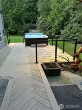 Another view of the herringbone deck and hot tub.  Plenty of room to entertain!