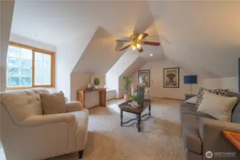 Spacious bonus room with and room at the end...the door at the end of the bonus room opens to a craft/hobby room!