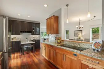 Chef's kitchen opens out to the deck.