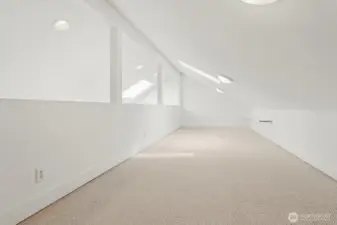 Loft over the bonus room is great for play area or storage.