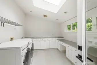 Massive laundry room with storage galore!
