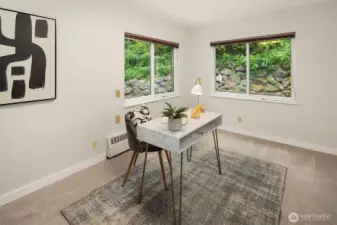 Shown here as an office, this 2nd bedroom on the main floor has it's own bathroom.