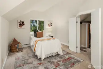 Upstairs bedroom with hidden room through the closet.