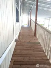 Ramp from the carport to the front door.