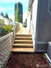 Stairs going to the back door