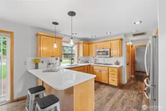 Beautiful new quartz countertops and tile backsplash!