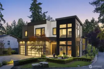 Impressive design and a tapestry of textures with brick, metal, concrete and clear cedar.