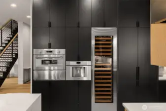 Thermadore Microwave and warming drawer with SubZero wine cooler.